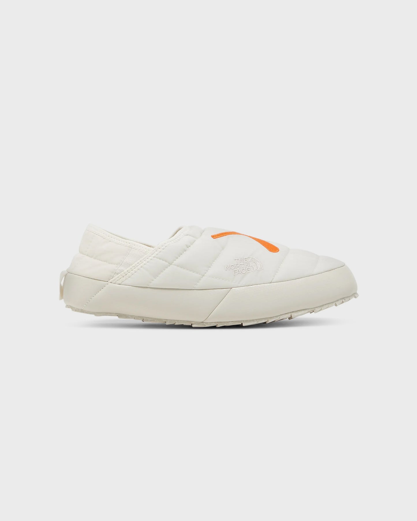 The North Face KAWS x ThermoBall Traction Mule VS Moonlight Ivory Orange